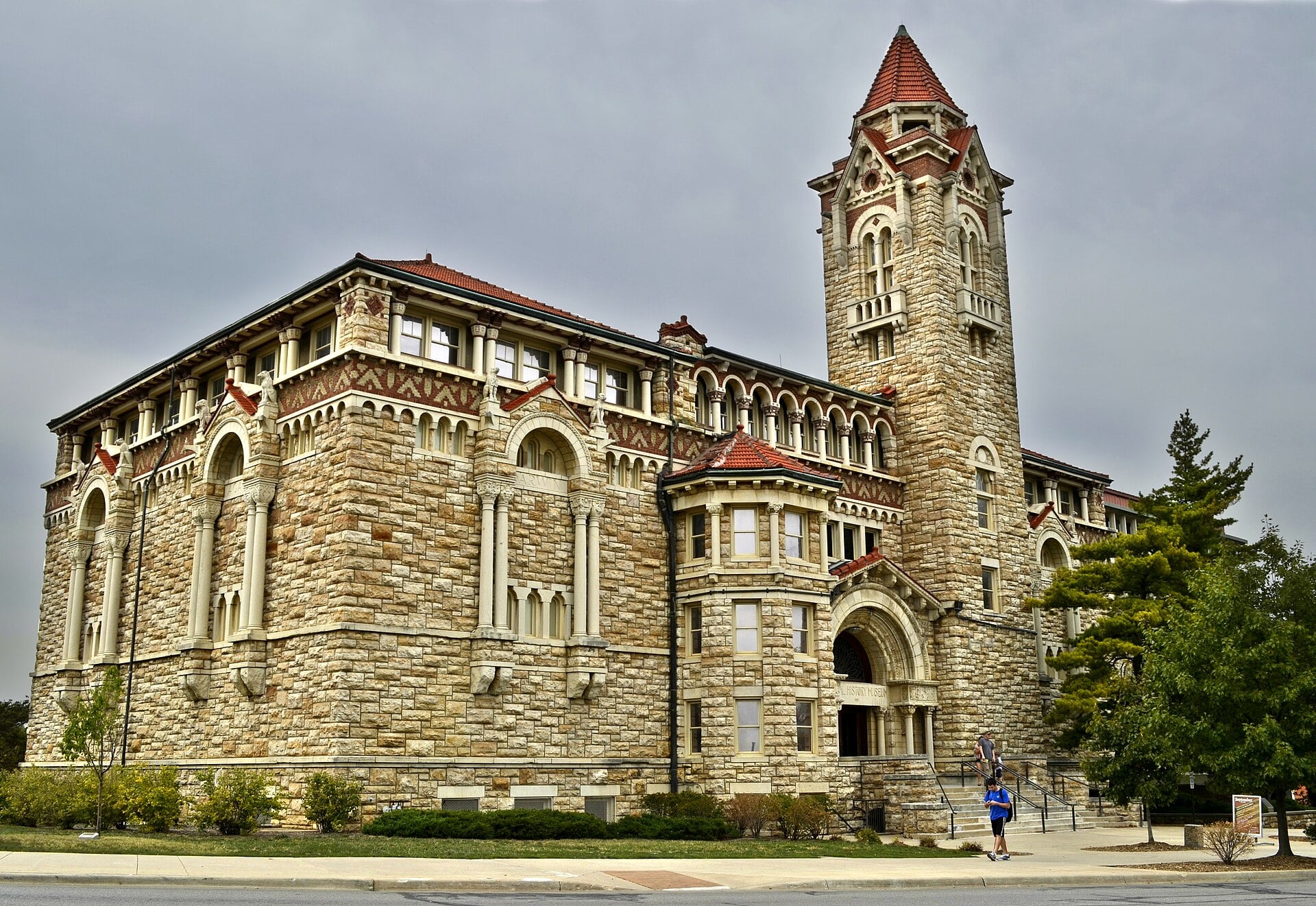 Dyche Hall, a stone building with a tall tower, home of the University of Kansas Natural History Museum