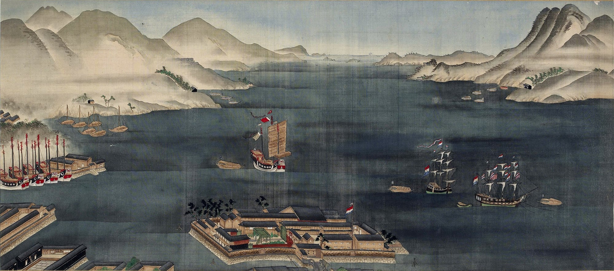 A painted silk scroll of Nagasaki harbour, with Dutch sailing ships at anchor and the small artificial island of Dejima flying a Dutch flag